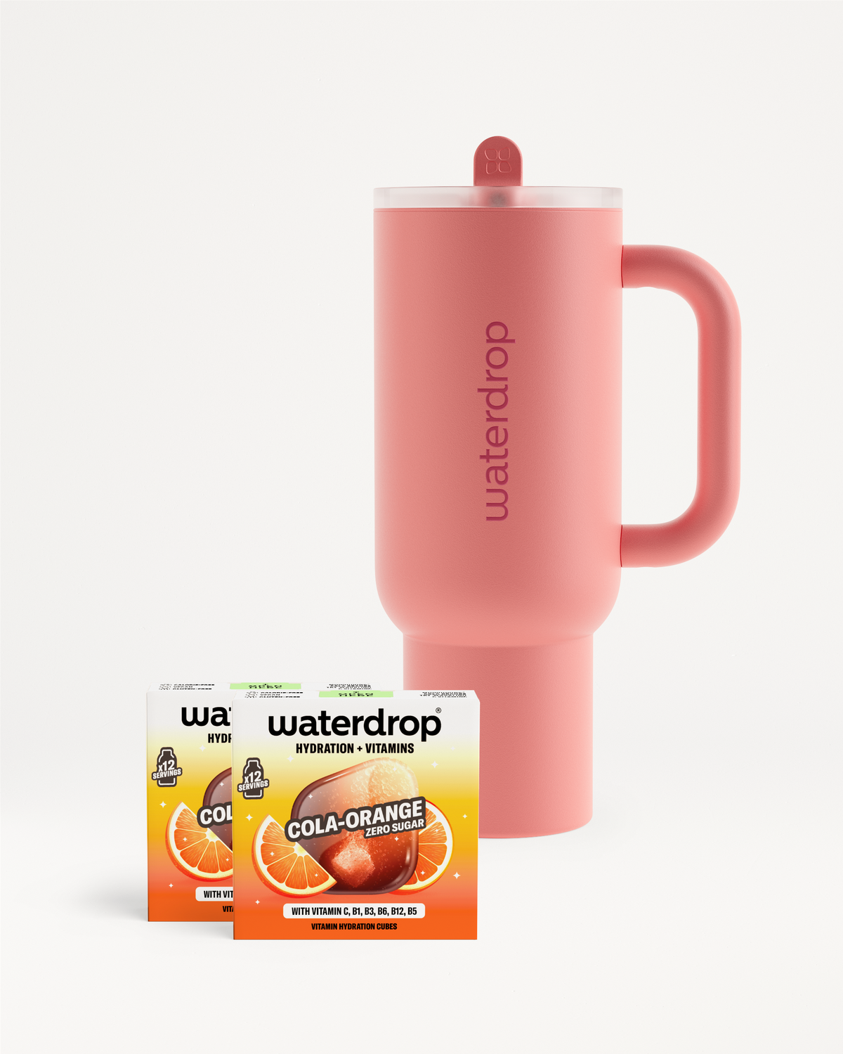 COLA ORANGE Explorer Set obsahuje Twin Pack COLA ORANGE a světle růžový Termo Hrnek Explorer.