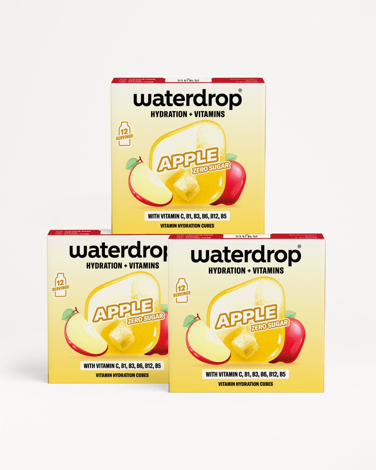 Tři žluté krabičky Waterdrop s ilustrací jablka, naskládané do trojúhelníku.