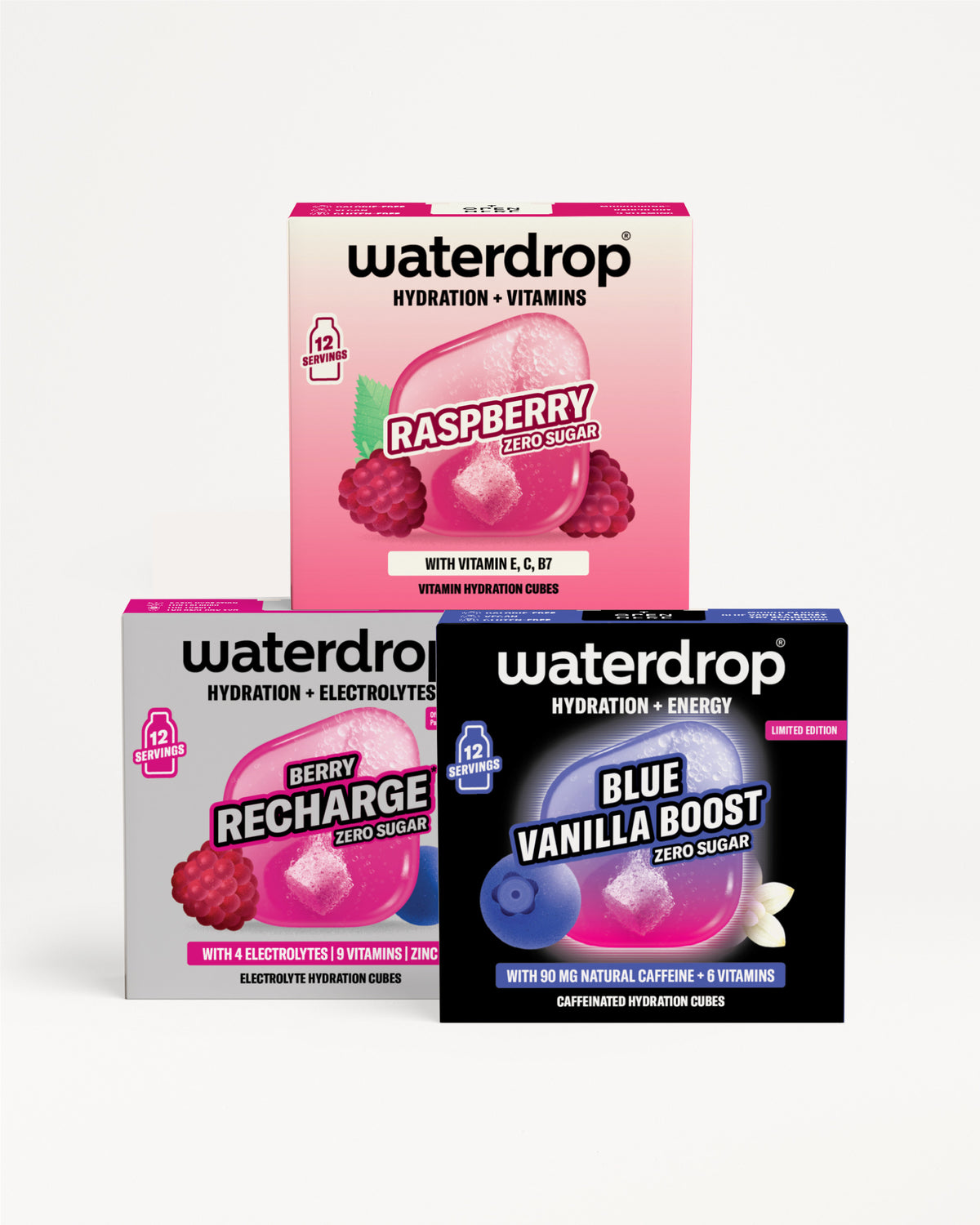 Tři krabičky Waterdrop pro hydrataci s příchutěmi Raspberry, Berry Recharge a Blue Vanilla Boost.