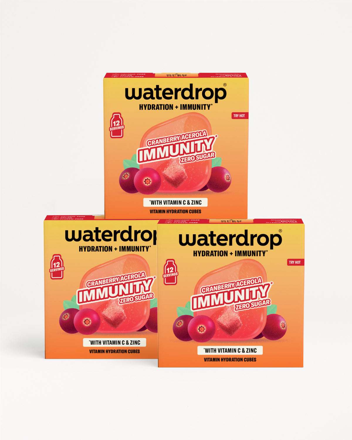 Tři krabičky Waterdrop pro hydrataci a imunitu naskládané do pyramidy na světlém pozadí.